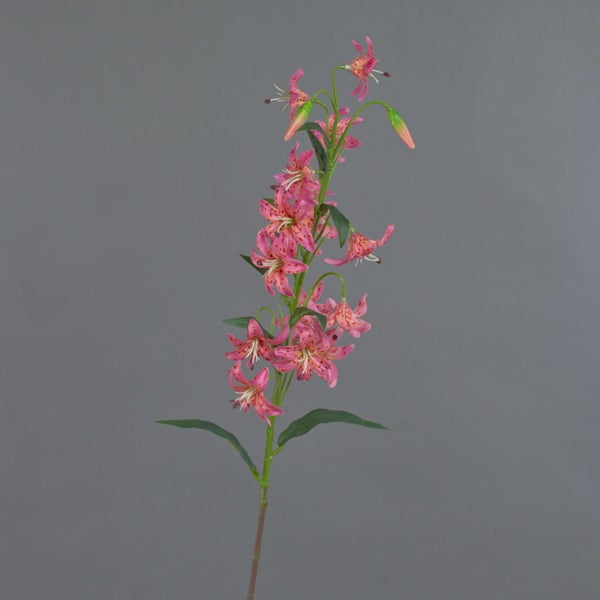 Künstlicher Lilienzweig mit rosa gepunkteten Blüten, grünen Blättern und Knospen