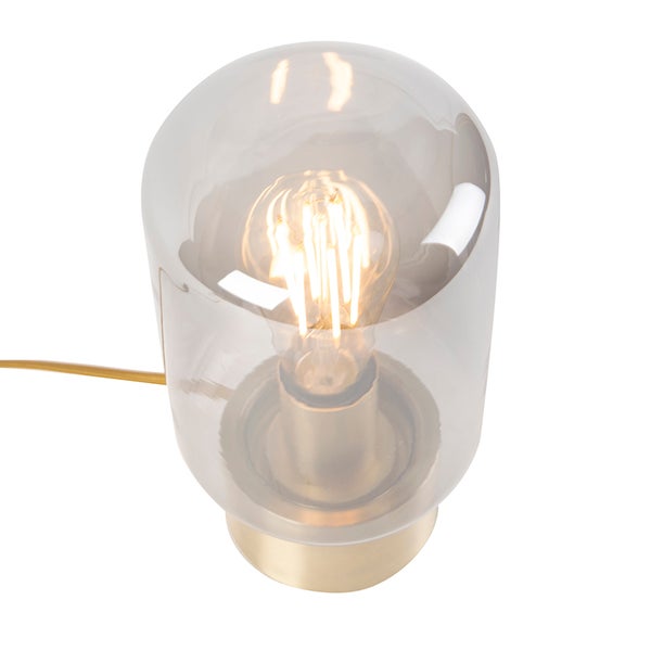 Tischleuchte mit Glasabdeckung und Glühbirne