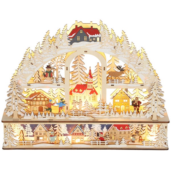 Beleuchteter Schwibbogen aus Holz mit winterlicher Dorfszene, Häusern, Figuren und Tannenbäumen.