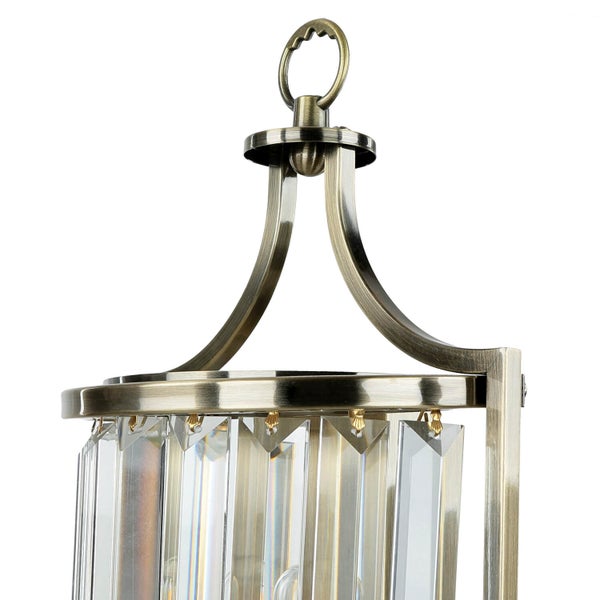 Detailaufnahme einer Wandleuchte mit Kristallglasverzierungen