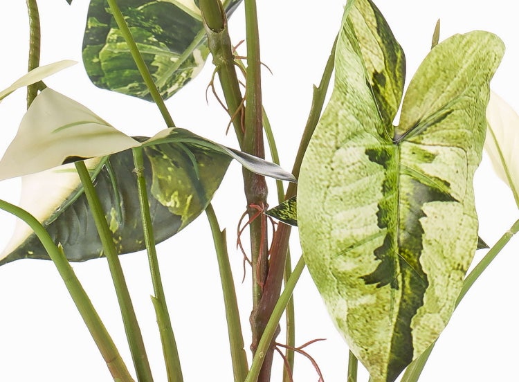 Künstliches Fensterblatt Monstera deliciosa variegata mit gemusterten Blättern und grünen Stielen.