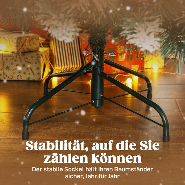 Stabiler Weihnachtsbaumständer aus Metall unter einem Tannenbaum auf Holzfussboden mit Geschenken im Hintergrund.