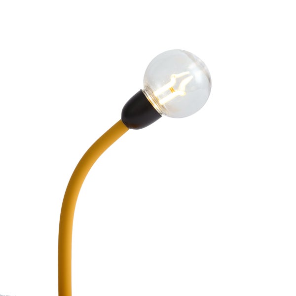 Gelbe Schreibtischlampe mit runder Glühbirne