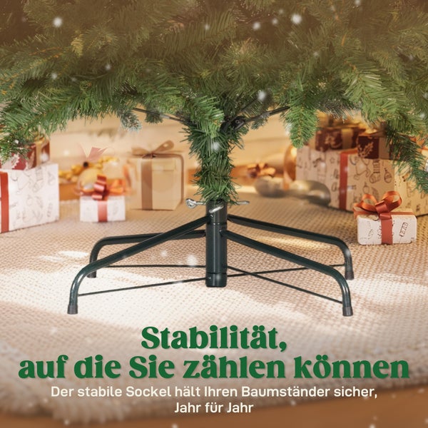 Stabiler Weihnachtsbaumständer aus Metall unter einem künstlichen Weihnachtsbaum mit Geschenken im Hintergrund.