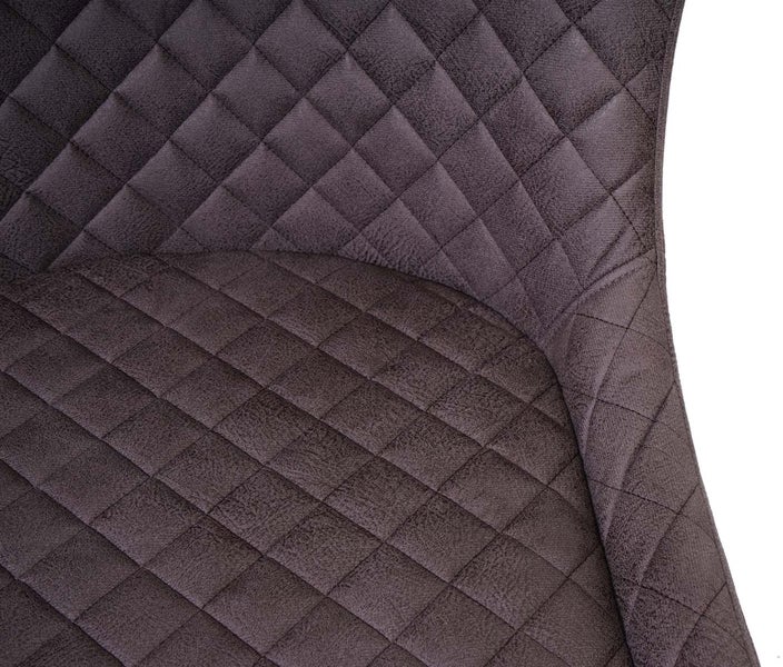 Detailaufnahme eines Stuhls mit Rautenmuster