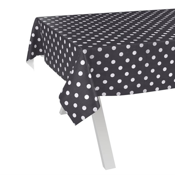 Tischdecke mit Punktmuster auf einem Tisch.