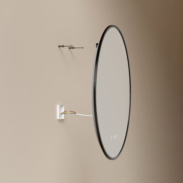 Ein runder LED-Badezimmerspiegel mit schwarzem Rahmen wird an einer Wand montiert, inklusive Schrauben, Dübeln und Elektroanschluss.