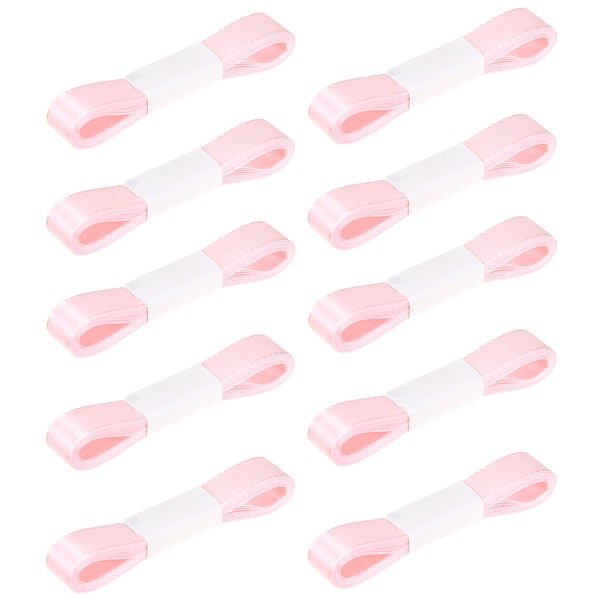 Zehn Spulen rosa Geschenkband