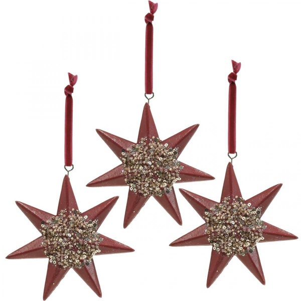 Drei rote Sterne mit Pailletten als Weihnachtsbaumschmuck