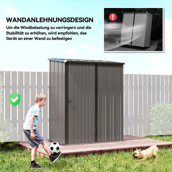 Flache graue Steine in einem schwarzen Netzbeutel.