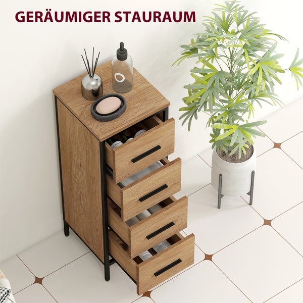 Schmaler Badunterschrank mit vier offenen Schubladen in Eichenoptik und schwarzem Metallrahmen neben einer Zimmerpflanze.