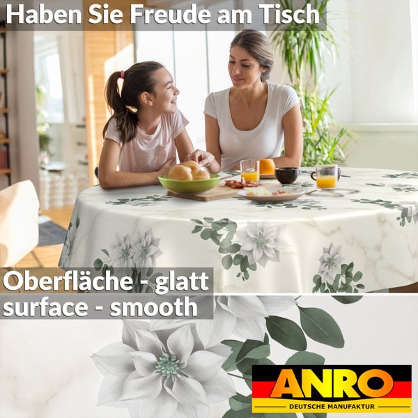 Runde Tischdecke mit Marmor-Optik und Blumenmuster. Mutter und Kind an einem Esstisch. Glatte Oberfläche. ANRO Deutsche Manufaktur Logo.