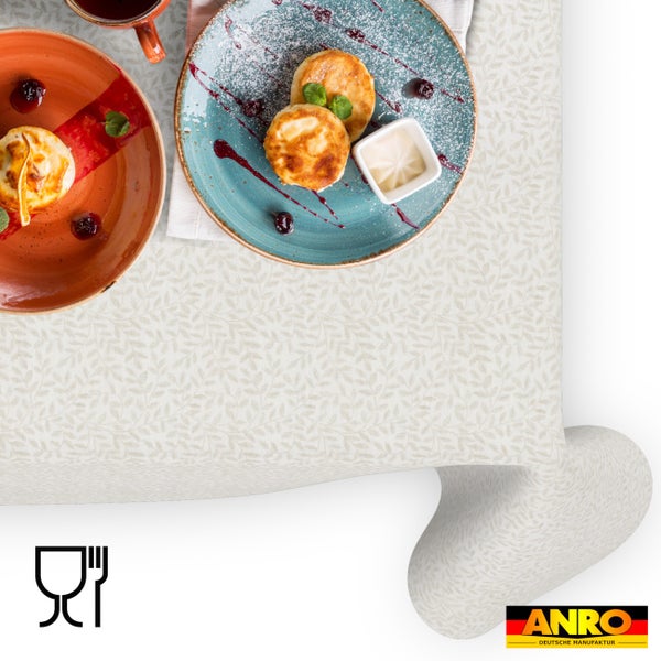 Abwaschbare Wachstuchtischdecke mit dezentem Blattmuster, lebensmittelecht, ANRO Logo.