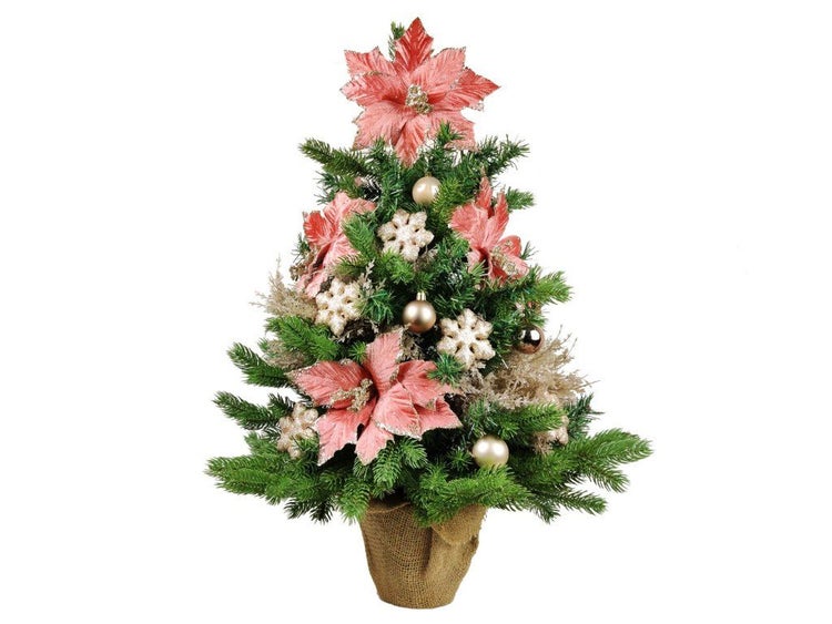 Künstlicher Weihnachtsbaum im Jutesack dekoriert mit Weihnachtssternen und Kugeln