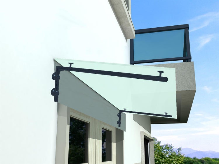 Glasvordach mit Halterung an einer Hauswand