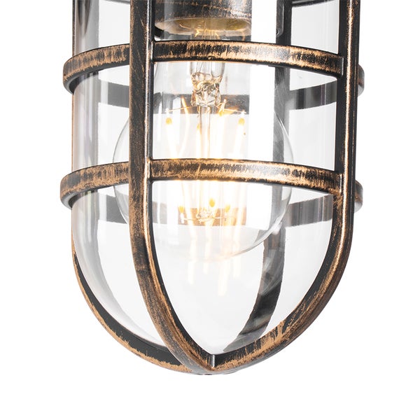 Außenwandleuchte im industriellen Design mit Metallgitter, Glaszylinder und sichtbarem Leuchtmittel.