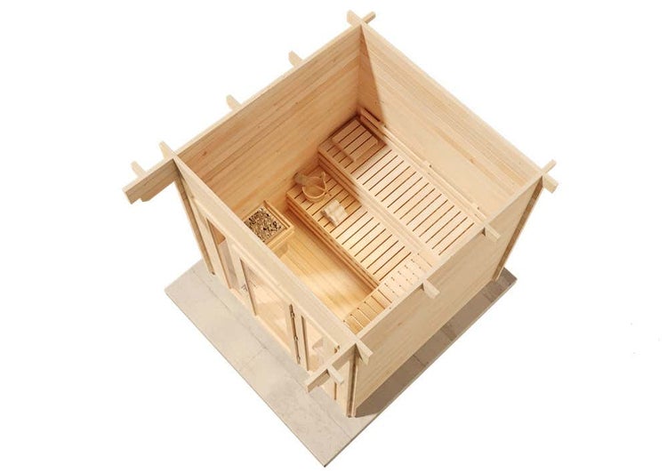 Innenansicht einer Sauna aus Holz mit abgestuften Sitzbänken, Saunaofen und Zubehör aus der Vogelperspektive.
