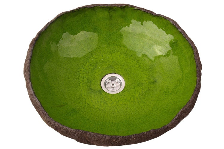 Aufsicht auf ein grünes Keramikwaschbecken mit Abfluss