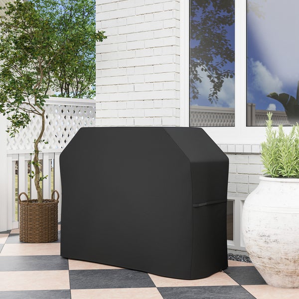 Schwarze Grillabdeckung auf einer Terrasse