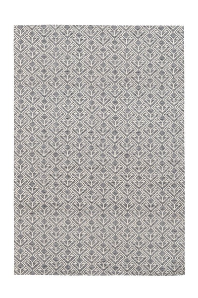 Moderner Teppich mit geometrischem Rautenmuster in Grau und Weiß.