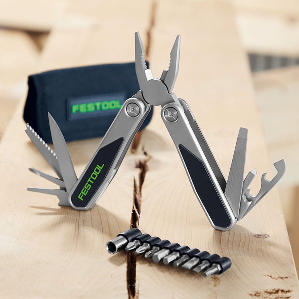 Festool Multitool mit verschiedenen Werkzeugen und Bit-Set auf einem Holztisch