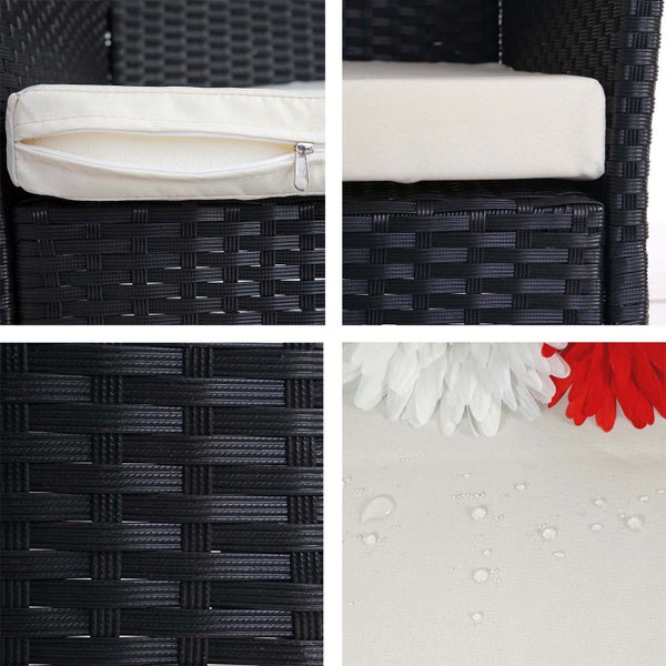 Detailansicht eines schwarzen Rattansessels mit cremefarbenem Sitzkissen und wasserabweisendem Bezug.