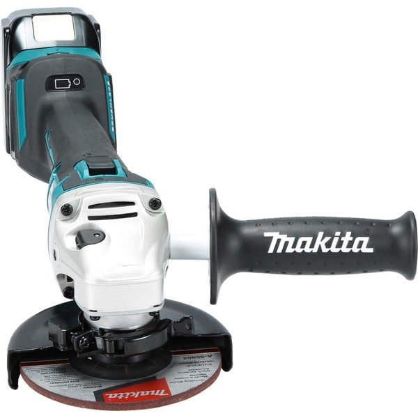 Makita Akkumulator-Winkelschleifer in Türkis und Schwarz mit silbernem Getriebekopf, Zusatzhandgriff und Schleifscheibe.