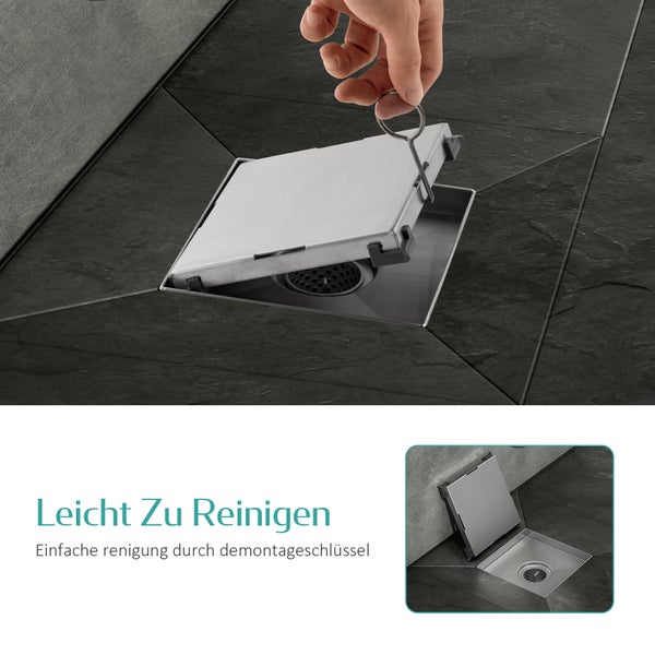 Hand hebt eine quadratische Duschablaufabdeckung aus Edelstahl mit einem Demontageschlüssel zur einfachen Reinigung an.