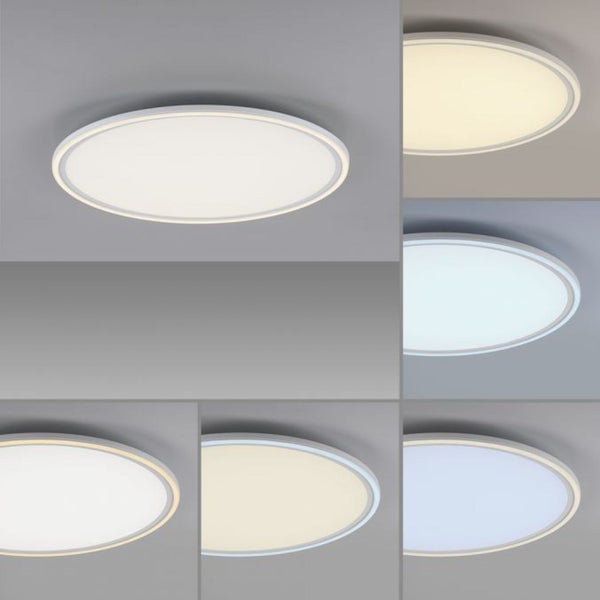 Ovaler Badezimmerspiegel mit LED Beleuchtung und Touch Sensor über einem Waschbecken in modernem Badezimmer.