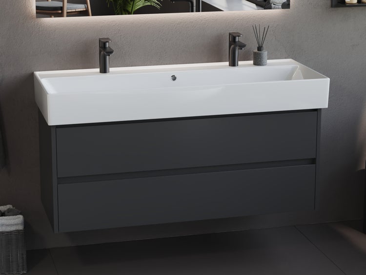 Waschtisch mit zwei Schubladen und Aufsatzwaschbecken im Badezimmer