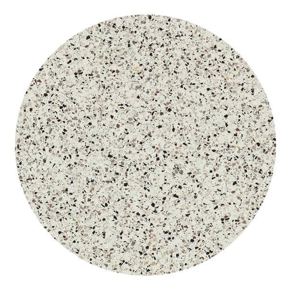Runde Tischplatte mit feinem Terrazzo-Muster und kleinen Steineinschlüssen.
