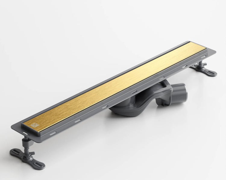 Duschrinne mit goldenem Einsatz und grauer Ablaufgarnitur