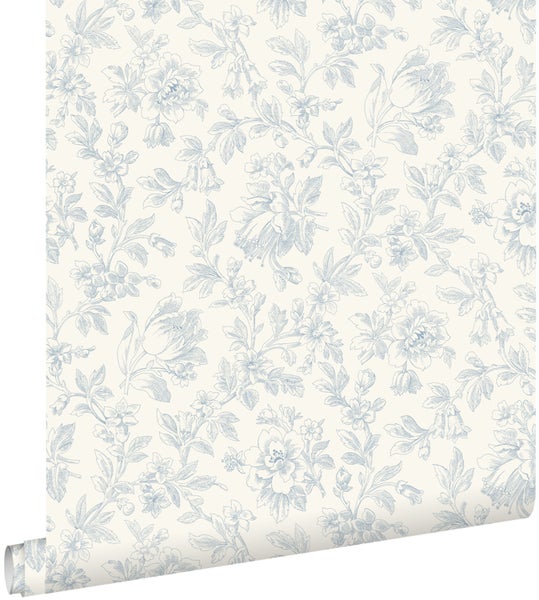 Vliestapete mit blauem Blumenmuster