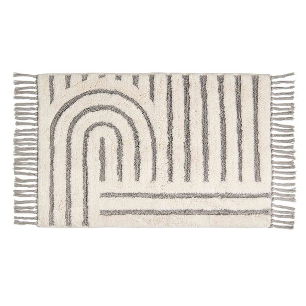 Teppich mit Fransen und abstraktem Muster