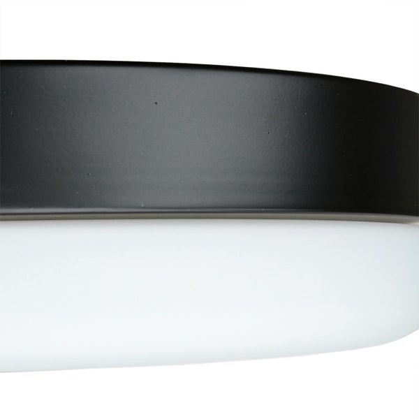 Detailaufnahme eines Wandleuchtkörpers in Schwarz und Weiss