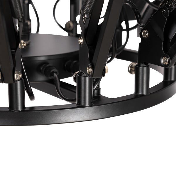 Detailansicht einer schwarzen Deckenleuchte mit Federmechanismus und Kabeln