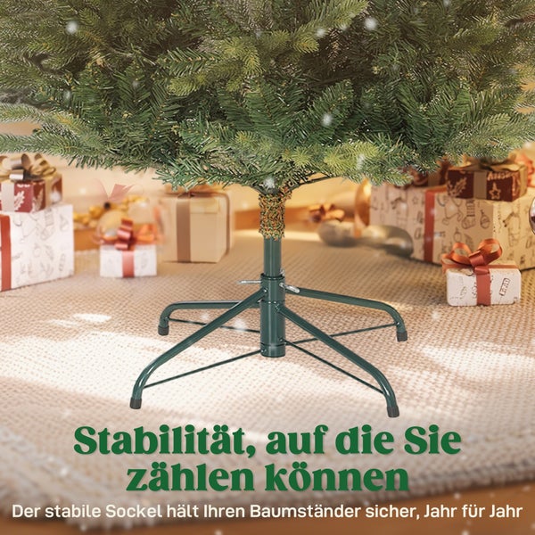 Stabiler Weihnachtsbaumständer aus Metall mit vier Standfüßen unter einem künstlichen Weihnachtsbaum, umgeben von Geschenken auf einem Teppich.