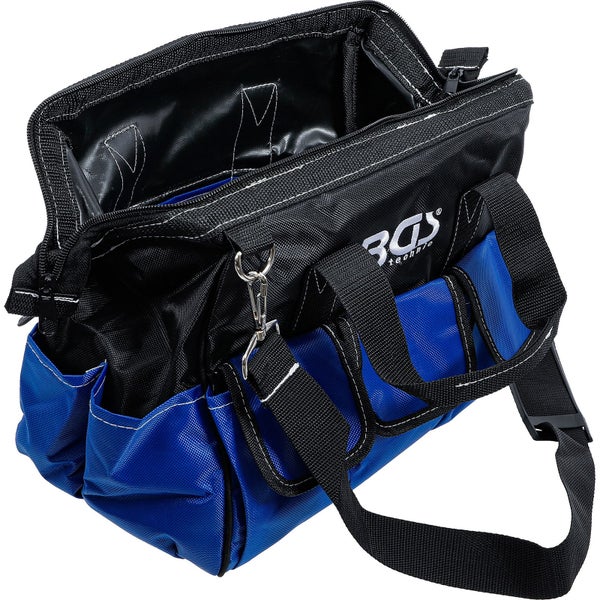 Offene Werkzeugtasche aus blauem und schwarzem Gewebe mit mehreren Außenfächern, Tragegriffen, einem Schultergurt und BGS Technic Logo.