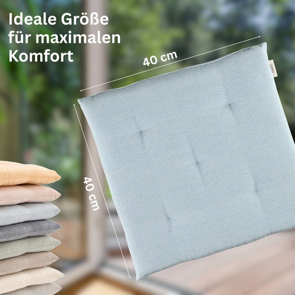 Quadratisches Sitzkissen mit Streifenmuster von Esprit, Maße 40 mal 40 Zentimeter.