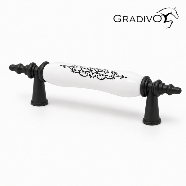 Möbelgriff aus weißer Keramik mit schwarzem Ornament und schwarzen Metallfüßen, Gradivo Logo.