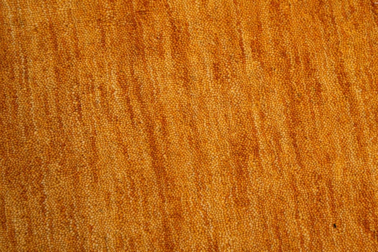 Wollteppich Luxus Designerteppich moderner uni Teppich aus reiner Schurwolle Gold 140x200 cm