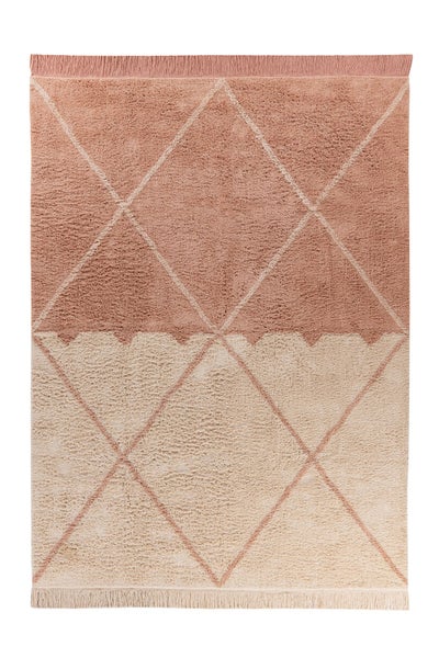 Hochflor-Teppich mit Rautenmuster und Fransen, zweifarbig in Rosa und Beige, weiche Textur.