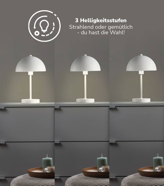 Moderne Tischleuchte mit kuppelförmigem Schirm und drei Helligkeitsstufen auf einer Kommode in verschiedenen Lichtstärken dargestellt.