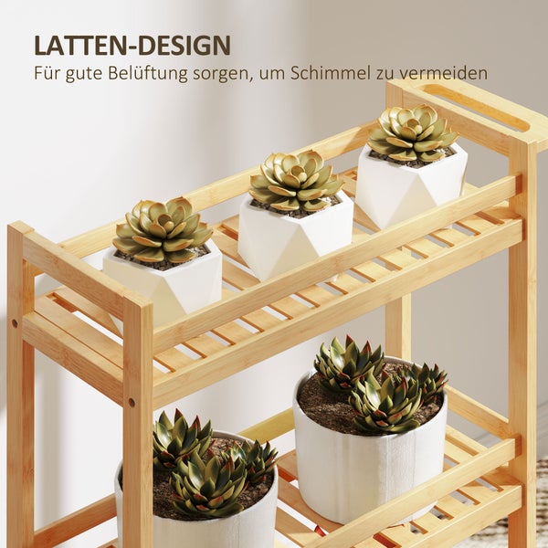 Bambusregal mit Latten-Design und Sukkulenten in weißen Töpfen