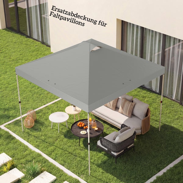 Graue Ersatzabdeckung für einen quadratischen Faltpavillon über einer Garten-Loungegruppe auf einer Rasenfläche.