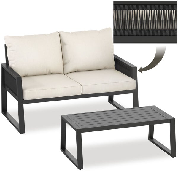 Garten-Lounge-Set mit 2-Sitzer-Sofa, cremefarbenen Kissen und Metall-Couchtisch, Detailansicht der Seilbespannung.