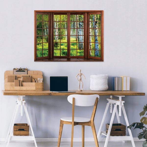 Wandbild mit Fensterausblick auf einen Birkenwald in einem hellen Arbeitszimmer mit Holztisch und weißem Stuhl.