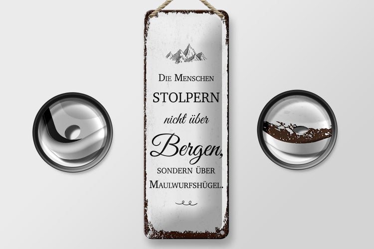 Blechschild Spruch Menschen stolpern nicht über Bergen 10x27cm