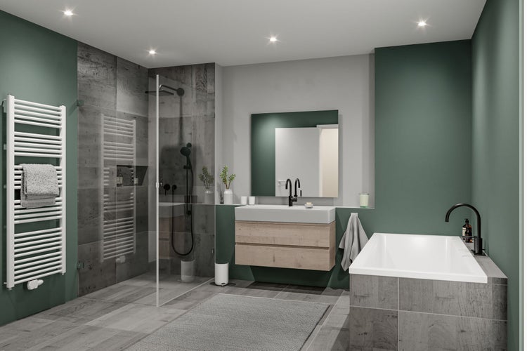 Modernes Badezimmer mit grünen Wänden, begehbarer Dusche, Badewanne, Waschtisch mit Holzunterschrank und weißem Handtuchheizkörper.