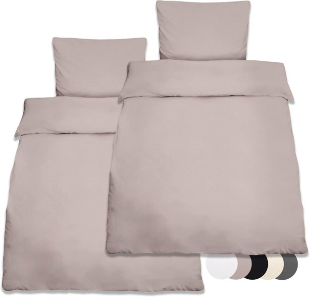 Bettwäsche-Set bestehend aus Bettbezug und Kopfkissenbezug aus Baumwolle in verschiedenen Farben.
